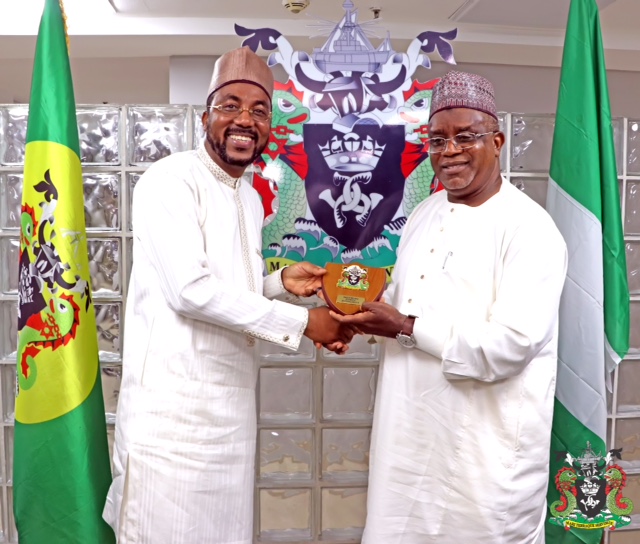 L-R: The Representative of the Managing Director, Nigerian Ports Authority (NPA), Executive Director, Finance and Administration, Mohammed Bello- Koko presents a plaque to the Chairman, House of Rep. Committee on Ports and Harbours, Hon. Garba Datti Muhammad, during a working visit at the NPA Corporate Headquarters in Lagos.