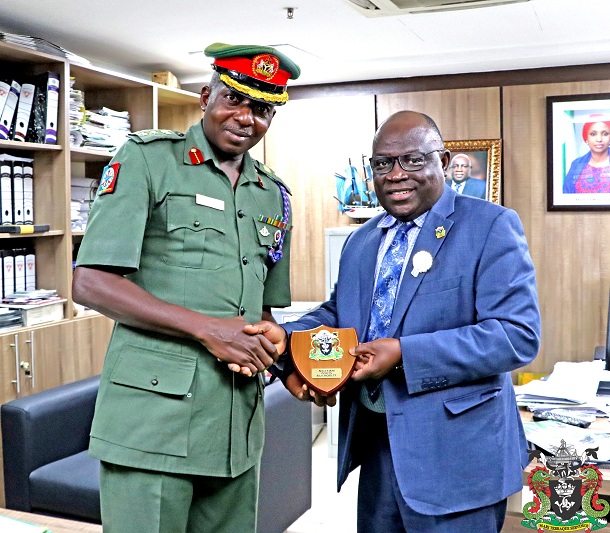R-L: The Representative of the Managing Director and General Manager, Corporate and Strategic Communications, Nigerian Ports Authority (NPA), Jatto Adams presenting a plaque to the Chairman / Board of Trustees (BOT), Peace & Conflict Resolution Resource Centre (PEACrEc), Colonel Kingsley Umoh during a courtesy call to the MD at the Corporate Headquarters in Lagos.