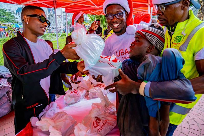 Uzoka, Wizkid Give Back to Thousands at the UBA Foundation Food Bank