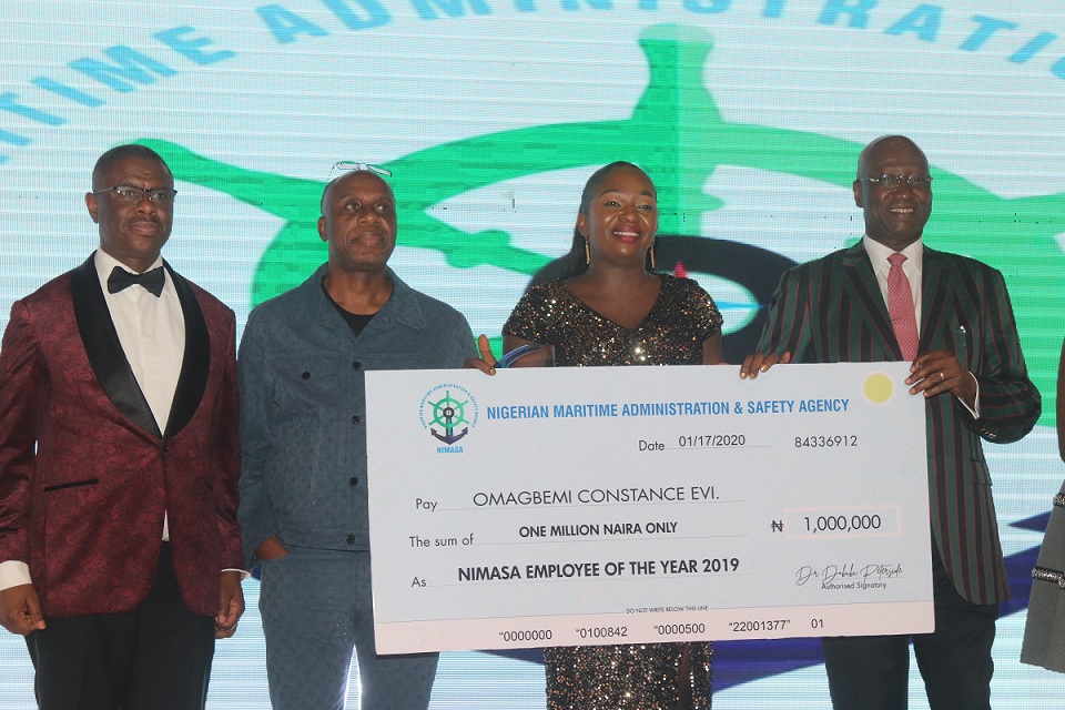 L-R: Director General, Nigerian Maritime Administration & Safety Agency, NIMASA, Dr. Dakuku Peterside, Minister of Transportation, Mr Chibuike Rotimi Amaechi, Winner, NIMASA Employee of the Year, Mrs Omagbemi Constance Evi, and the Secretary to the Government of the Federation, Mr Boss Mustapha and his wife, Funmilayo during the NIMASA Corporate Dinner & Merit Awards held in Lagos last night, January 18, 2020.
