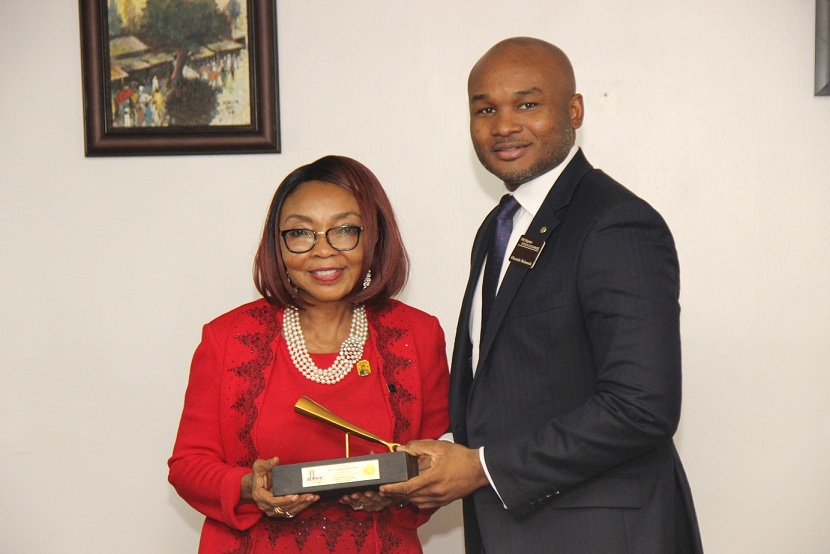 L – R shows Mr. Olumide Bolumole, Head, Listings Business Division, The Nigerian Stock Exchange (NSE) presenting a replica of the closing gong to Mrs. Rose Ada Okwechime, Managing Director/CEO, Abbey Mortgage Bank Plc during the visit of the Executive Management team to the Exchange today in Lagos.