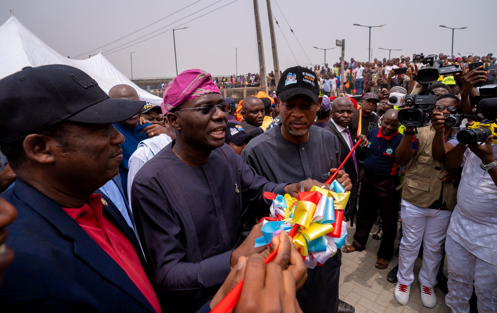 L-R: Lagos State Deputy Governor, Dr. Obafemi Hamzat; Governor Babajide Sanwo-Olu and Chairman, Bariga LCDA, Hon. Alabi Kolade during the commissioning of network of roads in Bariga, on Friday, February 14, 2020.
