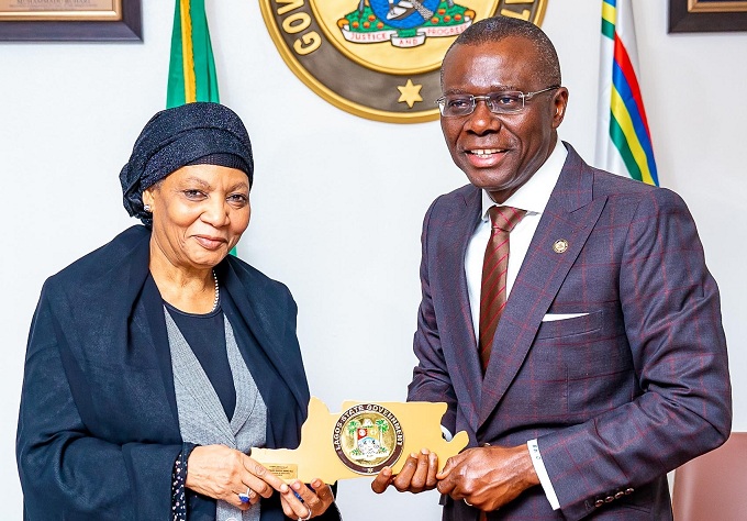 The President of the Court of Appeal, Hon. Justice Zainab Adamu Bulkachuwa (left) being presented with a plaque by the Lagos State Governor, Mr. Babajide Sanwo-Olu during a courtesy visit at Lagos House, Marina, on Wednesday, February 19, 2020.
