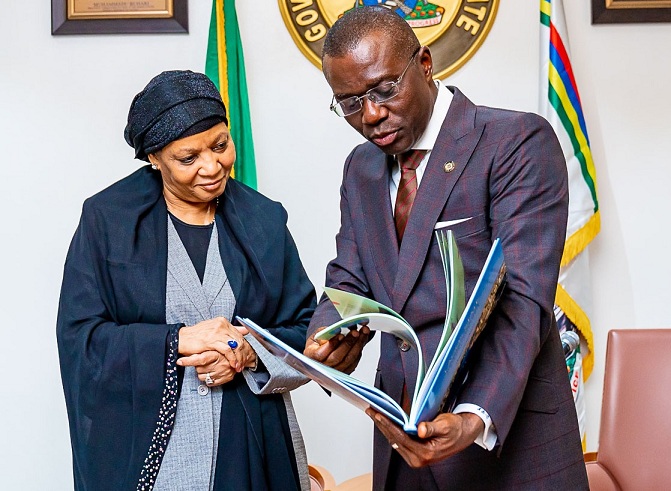 The President of the Court of Appeal, Hon. Justice Zainab Adamu Bulkachuwa (left) being presented with a Lagos State Compendium by Governor Babajide Sanwo-Olu during a courtesy visit at Lagos House, Marina, on Wednesday, February 19, 2020.