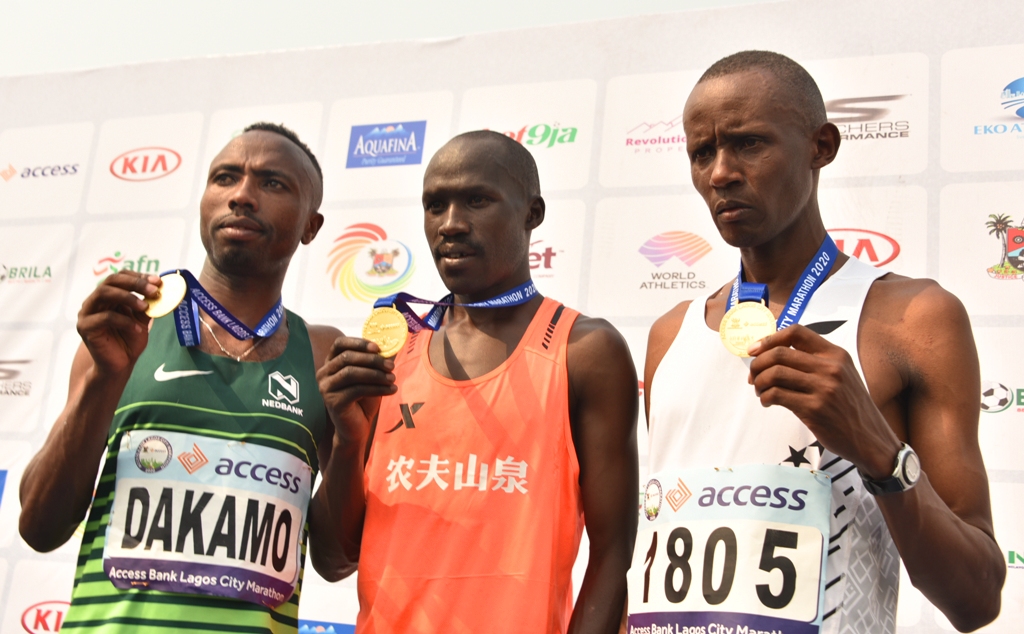 L-R: Winners of the Male category, 2nd Prize - Debeko Dakamo from Ethopia; 1st Prize - David Bamasai Tumo from Kenya and the 3rd Prize - Paul Waweru Chege from Kenya during the Lagos City Marathon, at Eko Atlantic City, Victoria Island, on Saturday, February 8, 2020.
