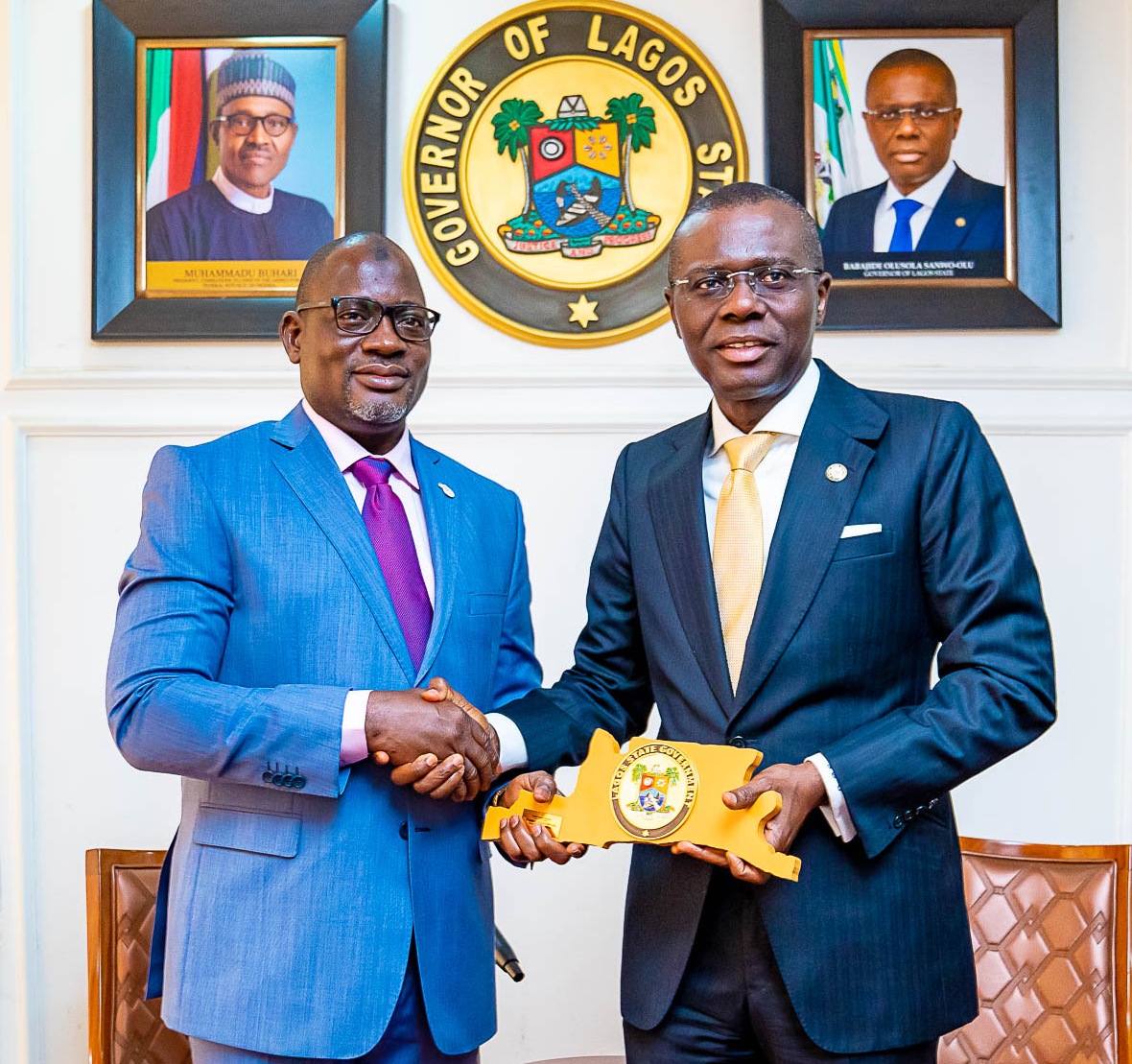 L-R: Chairman, Federal Inland Revenue Service (FIRS), Mr. Muhammad Mamman Nami, receiving a plaque from Lagos State Governor, Mr. Babajide Sanwo-Olu during a courtesy visit to the Governor at Lagos House, Alausa, Ikeja, on Tuesday, February 18, 2020.