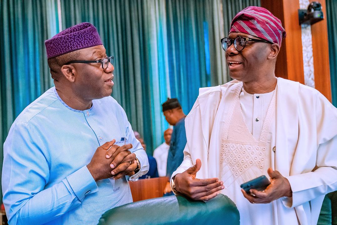 Lagos State Governor, Mr. Babajide Sanwo-Olu (right), in a discussion with his Ekiti State counterpart, Dr. Kayode Fayemi during the National Economic Council meeting at the Council Chamber, Aso Villa, Abuja on Thursday, March 19, 2020.