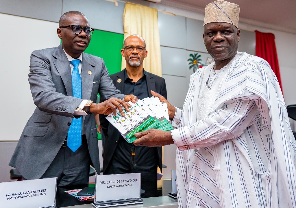 L-R: Lagos State Governor, Mr. Babajide Sanwo-Olu (left) presenting Coronavirus sensitisation materials to the Lagos State Chapter of the All Progressives Congress (APC), Hon. Tunde Balogun (right) during an advocacy meeting with Local Council Chairmen and other stakeholders on Coronavirus sensitisation at Lagos House, Alausa, on Monday, March 2, 2020. With them: Commissioner for Health, Prof. Akin Abayomi (middle).