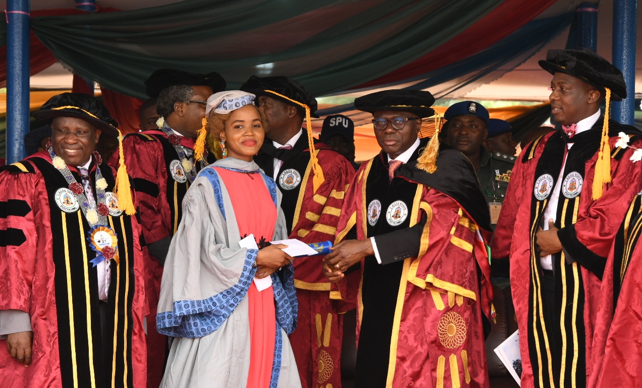 L-R: Rector, Lagos State Polytechnic, Mr. Samuel Sogunro; Overall Best Graduating Student, Miss Nkechi Alexandra Kingsley; Lagos State Governor, Mr. Babajide Sanwo-Olu and Special Adviser to the Governor on Education, Mr. Tokunbo Wahab during the 27th Convocation and Award Ceremony of Lagos State Polytechnic at the Convocation Ground, Ikorodu Campus, Lagos, on Thursday, March 12, 2020.