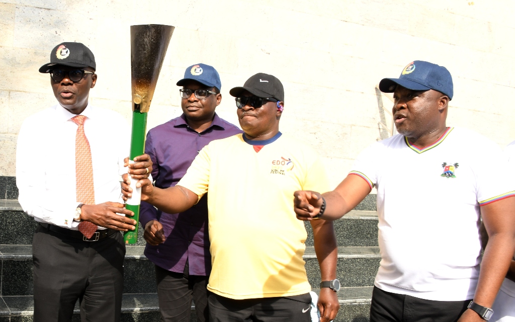 L-R: Lagos State Governor, Mr. Babajide Sanwo-Olu; Commissioner for Youth and Social Development, Mr. Segun Dawodu; representative of Minister of Youth and Sport and Co-ordinator, South West Zone 1, Mr. Femi Ajao and Chairman, Lagos State Sport Commission (LSSC), Mr. Sola Aiyepeku, during the presentation of the National Sport Festival “Edo 2020” Unity Torch to the Governor, at the Lagos House, Alausa, Ikeja, on Thursday, March 12, 2020.