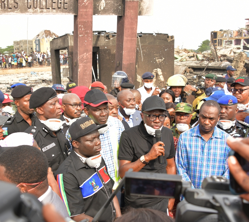 Lagos State Governor, Mr. Babajide Sanwo-Olu (second right), addressing residents and journalists during his visit to the scene of Abule Ado fire explosion on Monday, March 16, 2020. With him: Deputy Governor, Dr. Obafemi Hamzat (right); Chairman, Amuwo Odofin LG, Mr. Valentine Buraimoh (left); Commissioner of Police, Lagos Command, Mr. Hakeem Odumosu (left behind); Commissioner for Special Duties and Inter-governmental Relations, Engr. Tayo Bamgbose-Martins (second left) and other members of the State Executive Council.