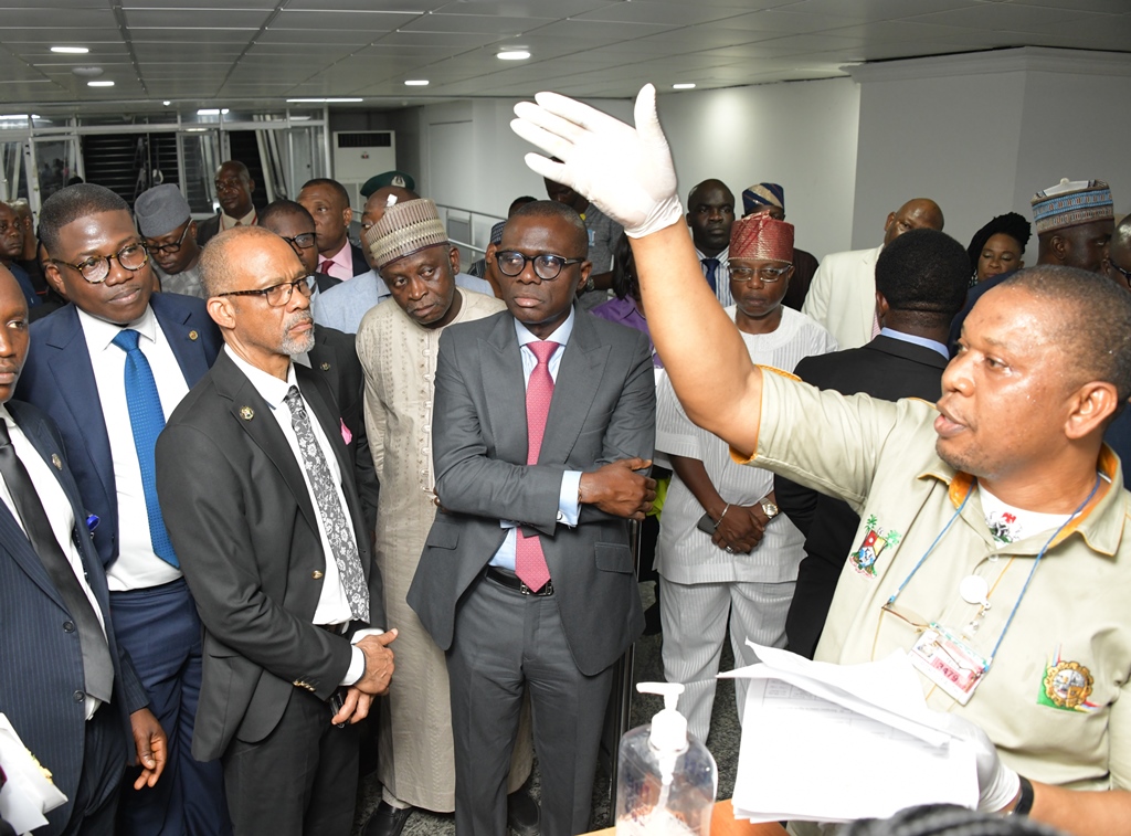 L-R: Head of Service, Mr. Hakeem Muri-Okunola; Commissioner for Health, Prof. Akin Abayomi; Director of Airport Operations, FAAN; Capt. Murktar Muye and Lagos State Governor, Mr. Babajide Sanwo-Olu, being briefed by an official on the Coronavirus screening procedure at the Murtala Muhammed International Airport, Lagos during an on-the-spot assessment on Tuesday, March 17, 2020.