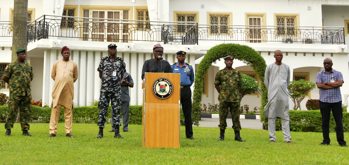 L-R: Commander, 9 brigade, Ikeja Army Cantonment, Brigadier General Etsu Ndagi; Director, Department of Security Service (DSS), Mr. Abdulfatai Sanusi; Commissioner of Police, Lagos Command, Mr. Hakeem Odumosu; Governor Babajide Sanwo-Olu; Commander, Nigeria Navy Ship (NNS) Beecroft, Apapa, Commodore Ibrahim Aliyu Shettima; Commander, 651 Base Services Group, Nigerian Air Force Base, Ikeja, Air Commodore Rasaq Olanrewaju; the Chief of Staff to the Governor, Mr. Tayo Ayinde and Executive Secretary/CEO, Lagos State Security Trust Fund (LSSTF), Dr. Abdurrazaq Balogun, during a media briefing shortly after the State’s Security Council meeting at Lagos House, Marina, on Saturday, April 4, 2020.