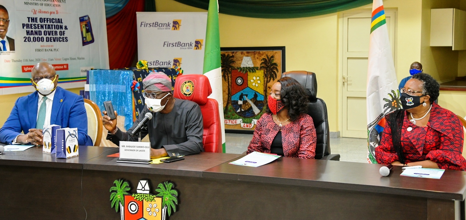 L-R: Managing Director/CEO, First Bank PLC, Dr. Adeola Adeduntan; Lagos State Governor, Mr. Babajide Sanwo-Olu; his wife, Dr. Ibijoke and Commissioner for Education, Mrs. Folasade Adefisayo, during the presentation of 20,000 E-Learning devices for Lagos State Schools by First Bank at the Lagos House, Marina, on Thursday, June 11, 2020.