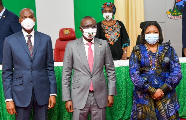 L-R: Chairman, Board of Lagos State Security Trust Fund (LSSTF), Mr. Kehinde Durosinmi-Etti; Governor Babajide Sanwo-Olu; Chairman, Board of Lagos State Employment Trust Fund (LSETF), Mrs. Bola Adesola during the inauguration of the boards at Lagos House, Alausa, Ikeja, on Tuesday, July 21, 2020.