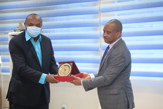 Director General, Nigerian Maritime Administration and Safety Agency (NIMASA), Dr. Bashir Jamoh making a presentation to the President, National Association of Stevedoring Companies (NASC) Mr. Bolaji Sunmola during a courtesy visit by NASC to the Agency in Lagos recently.