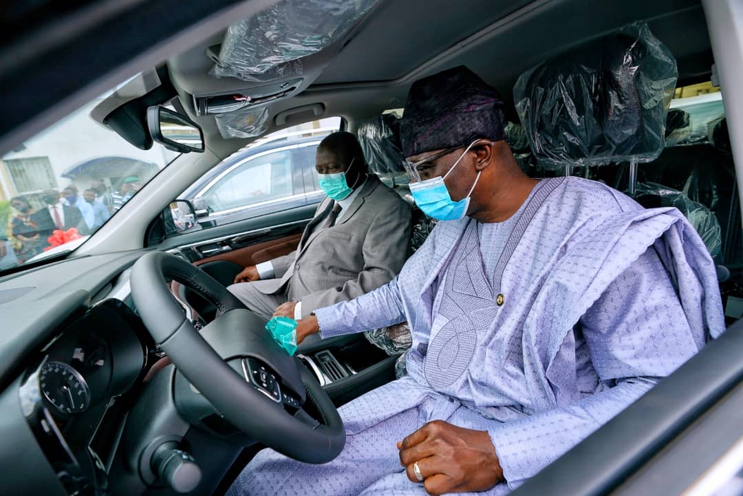 Lagos State Governor, Mr. Babajide Sanwo-Olu (right) with Chief Judge of Lagos State, Hon. Justice Kazeem Alogba, during a test drive session at the handing over of official vehicles to Judges of the Lagos State Judiciary at the High Court Ikeja, on Wednesday, September 23, 2020.