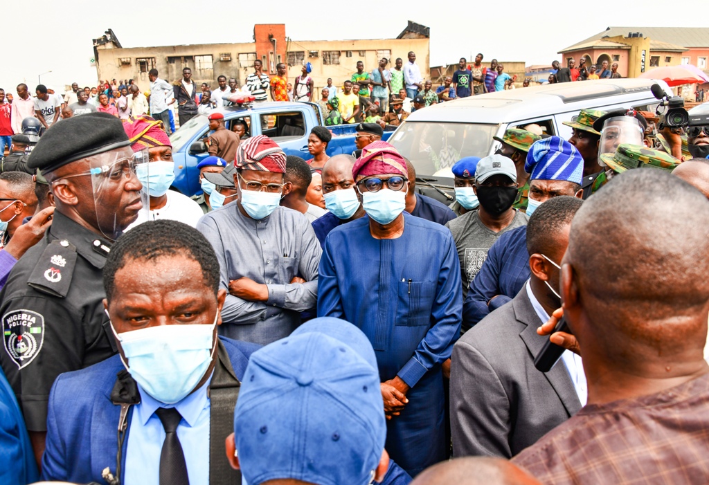 L-R: Commissioner of Police, Lagos Command, Mr. Hakeem Odumosu; Lagos Head of Service, Mr. Hakeem Muri-Okunola; Governor Babajide Sanwo-Olu and his Deputy, Dr. Obafemi Hamzat, during an on-the-spot assessment of properties damaged at Fagba, Ifako-Ijaiye, on Tuesday, October 27, 2020.