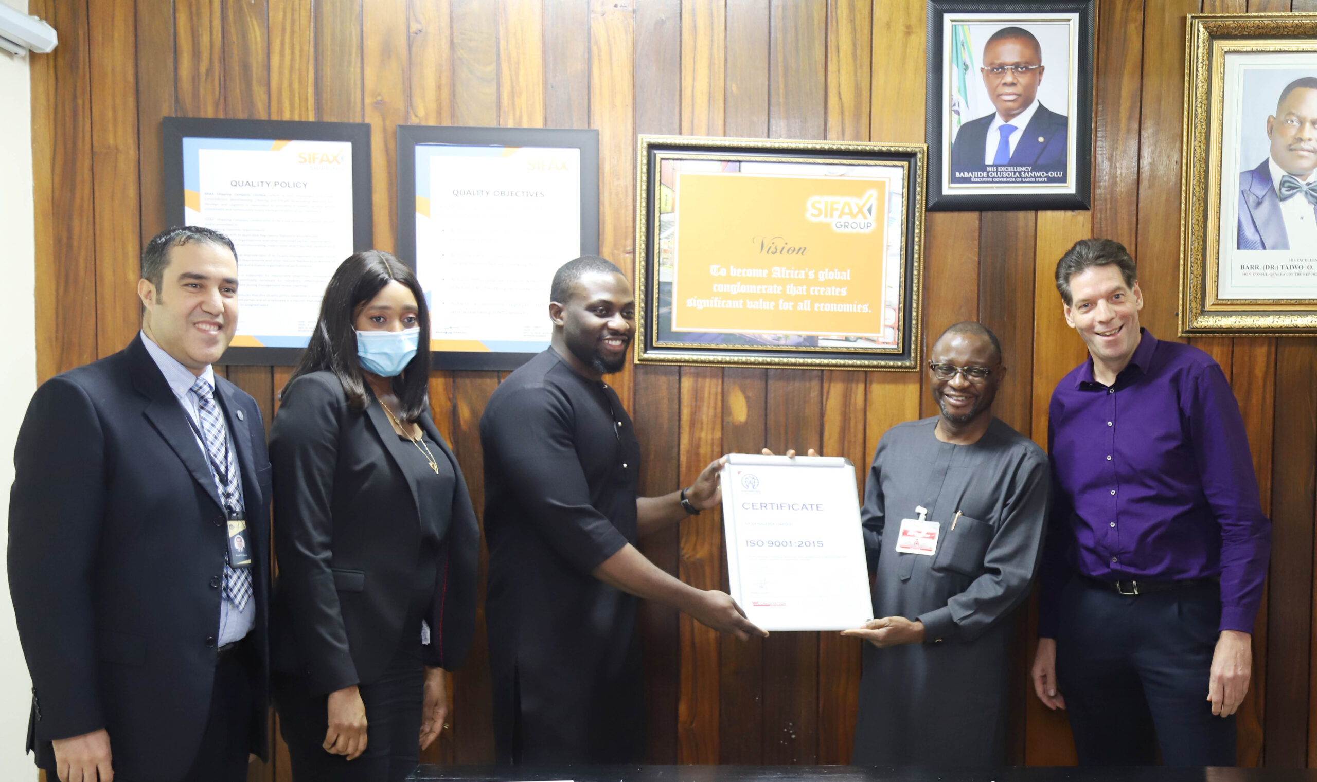 L-R: Samuel Sawah, Technical Director; Francisca Dyegh, Executive Director, Business Development and Ope Bashorun, Chief Executive Officer all of West Sealand Int’l Security Services Limited presenting the International Organisation for Standardisation 9001:2015 (ISO) certificate to Adekunle Oyinloye, Group Managing Director, SIFAX Group and Paul vd Linden, Managing Director, SIFAX Logistics. Three of SIFAX Group’s subsidiaries- Ports & Cargo Handling Services Limited, SIFAX Shipping Company Limited and SIFAX Nigeria Limited all bagged the ISO 9001:2015 certificates. The award presentation ceremony was held at SIFAX Group’s head office at Apapa, Lagos, today.
