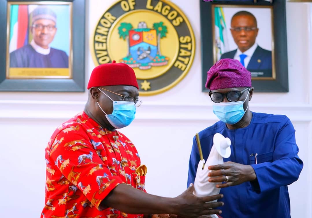 Abia State Governor, Dr. Okezie Ikpeazu (left) being presented with an Eyo effigy by the Lagos State Governor, Mr. Babajide Sanwo-Olu, during his courtesy visit at Lagos House, Alausa, on Wednesday, November 11, 2020.