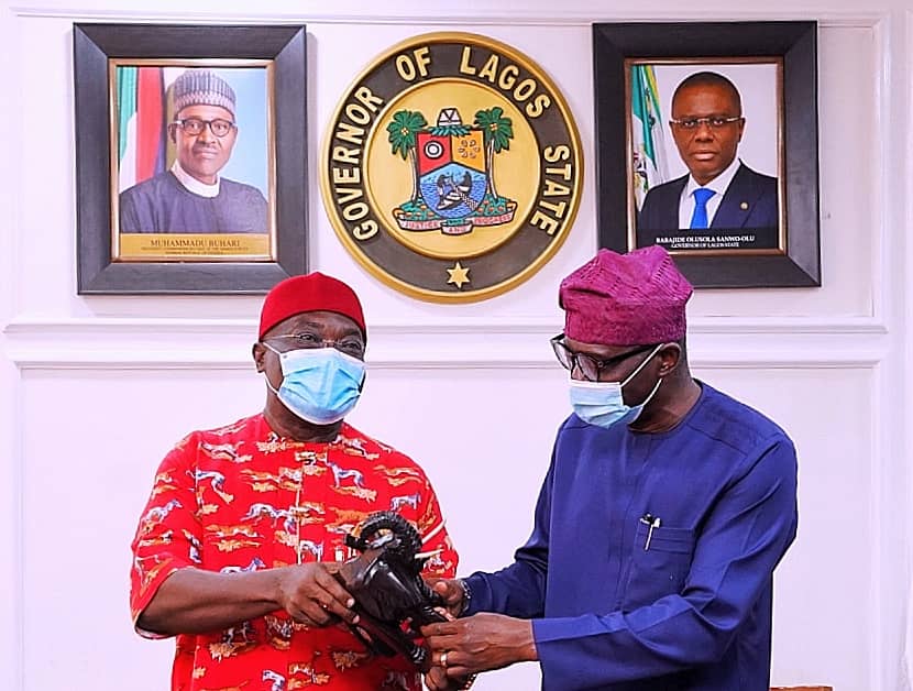 Abia State Governor, Dr. Okezie Ikpeazu (left) presenting a souvenir to the Lagos State Governor, Mr. Babajide Sanwo-Olu, during his courtesy visit at Lagos House, Alausa, on Wednesday, November 11, 2020.