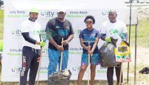 World Earth Day 2022: Unity Bank, RESWAYE, Others Clean Lagos Beach, Plant Trees