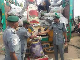  Dangote Trucks Impounded With 300 Bags Of Smuggled Foreign Rice 